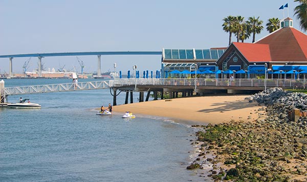 Coronado Ferry Landing Shops with bay bridge in distance